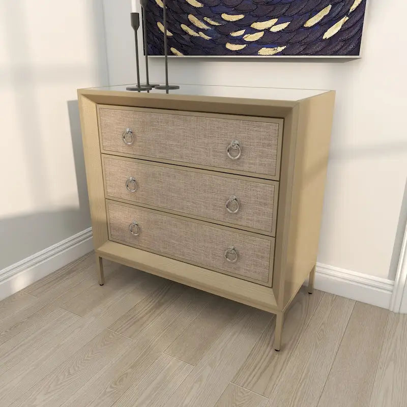 Cassettiera in legno con pannello frontale imbottito, 3 cassetti, piano a specchio e maniglie ad anello - Beige